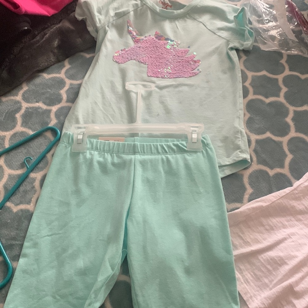 Kids Size Medium 7/8 blue shirt with sequin unicorn and blue shorts